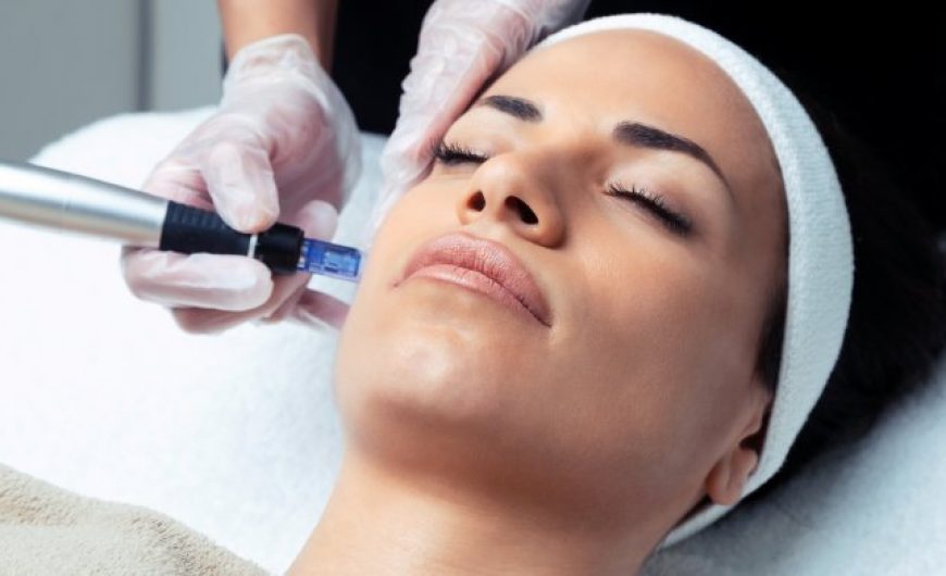 Cosmetologist making mesotherapy injection with dermapen on face